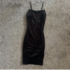 Elegant Black Dress with Chain Straps